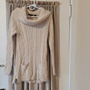 Nice cowl neck sweater.